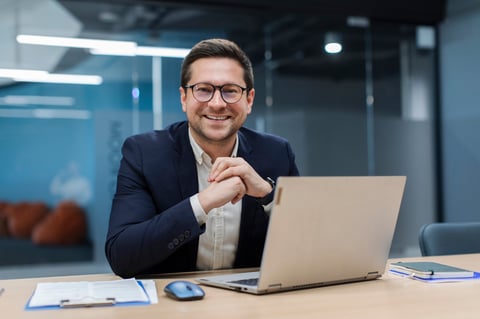 Business owner working on laptop